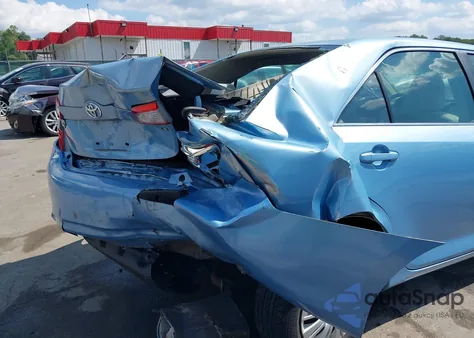 2012 Toyota Camry Le z USA, uszkodzony, nr VIN 4T4BF1FK2CR269105